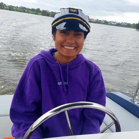 a person in a boat on a body of water