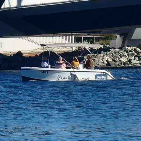 a small boat in a large body of water