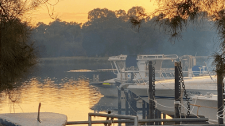 a sunset over a body of water