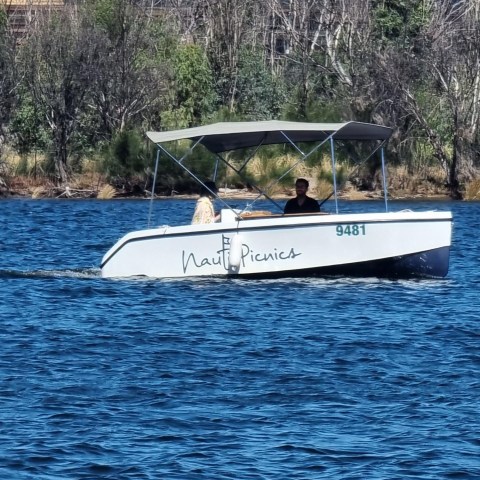 a small boat in a body of water